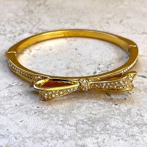 Kate, spade, rhinestone bow, gold tone bracelet.